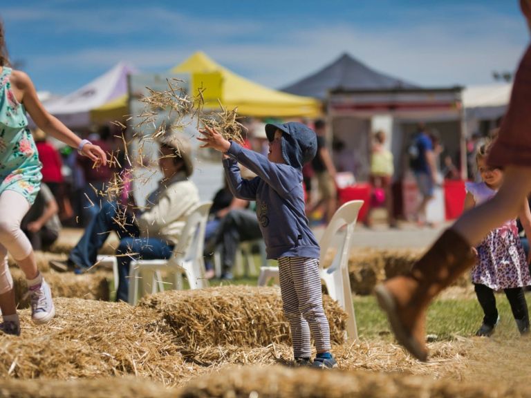 Child throwing straw