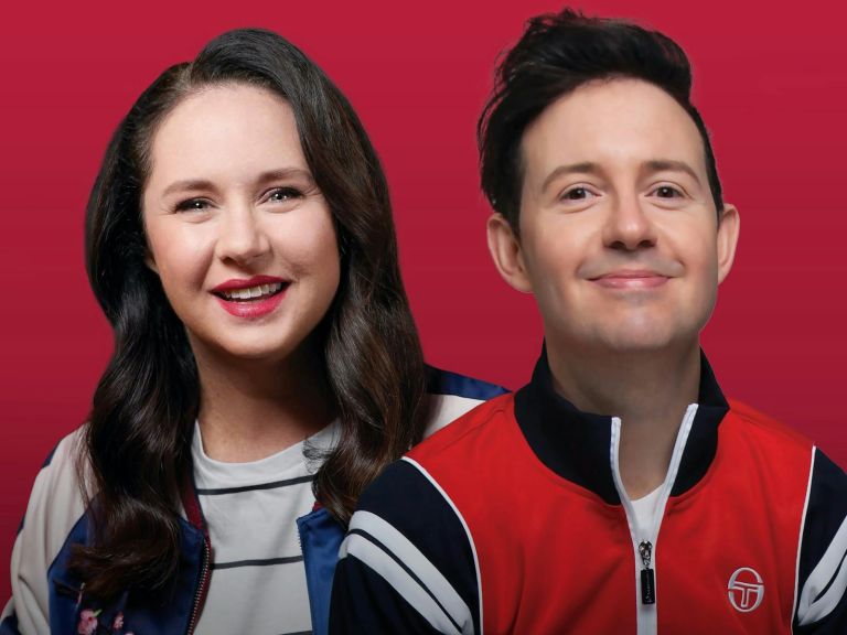 Mel Buttle and Nath Valvo look in the camera in front of a red background.