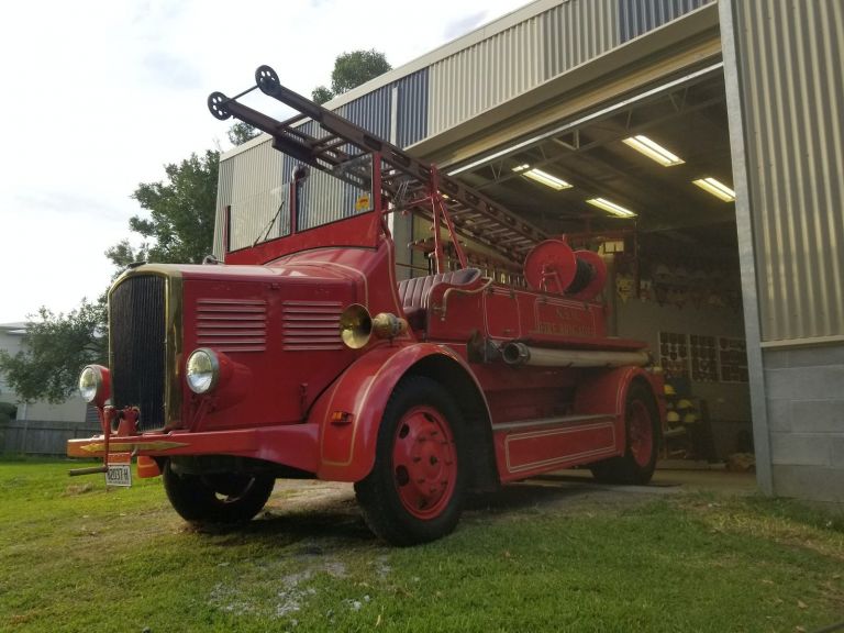 Historical Fire Engine in front of shed