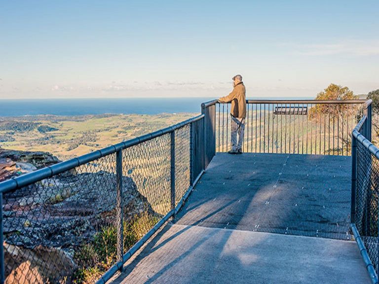 A man stands at Jamberoo lookout, Budderoo National Park. Photo credit: Michael Van Ewijk &copy;