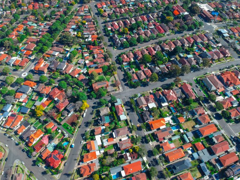 An aerial view of rooftops in a neighbourhood in Sydney.
